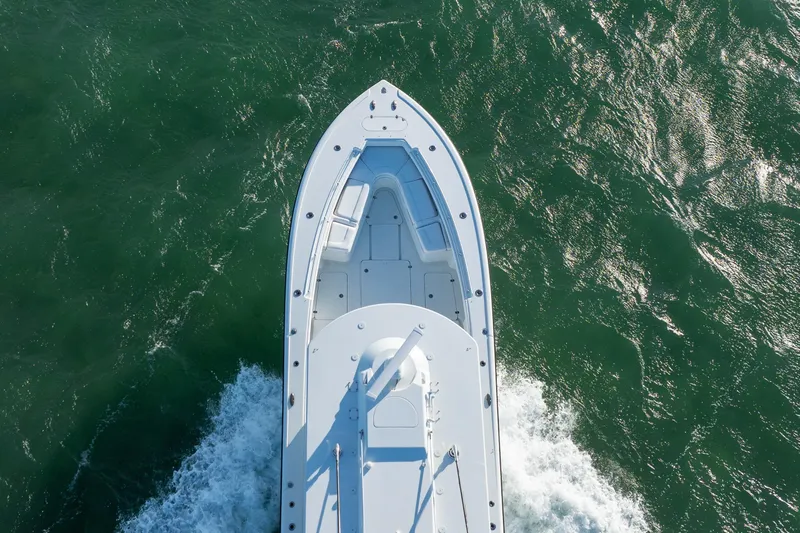  Yacht Photos Pics Aerial view of 2022 Yellowfin 39 Offshore boat cruising on the ocean.