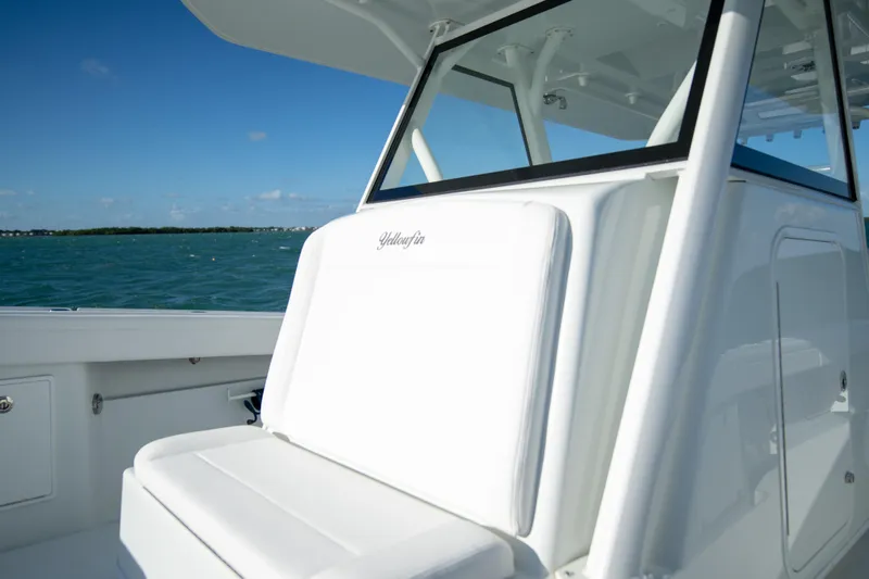  Yacht Photos Pics 2022 Yellowfin 39 Offshore boat with sleek white seating and ocean backdrop.