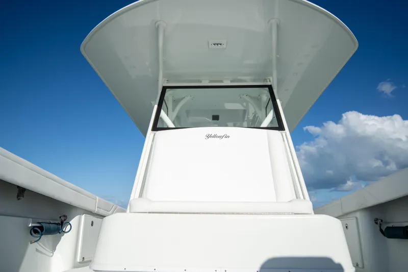  Yacht Photos Pics 2022 Yellowfin 39 Offshore boat against a clear blue sky.