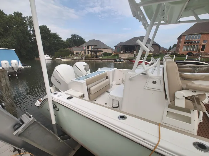  Yacht Photos Pics 2017 Sea Fox 328 Commander boat docked in a residential marina.