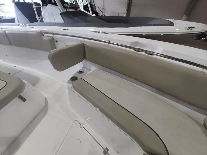  Yacht Photos Pics 2017 Sea Fox 328 Commander boat interior with beige seating and white deck.