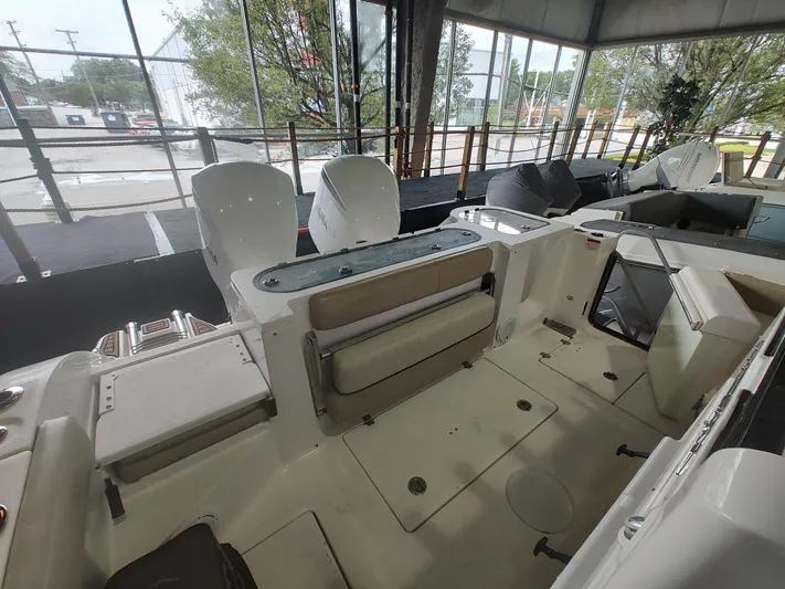  Yacht Photos Pics 2017 Sea Fox 328 Commander boat interior with seating and dual engines.