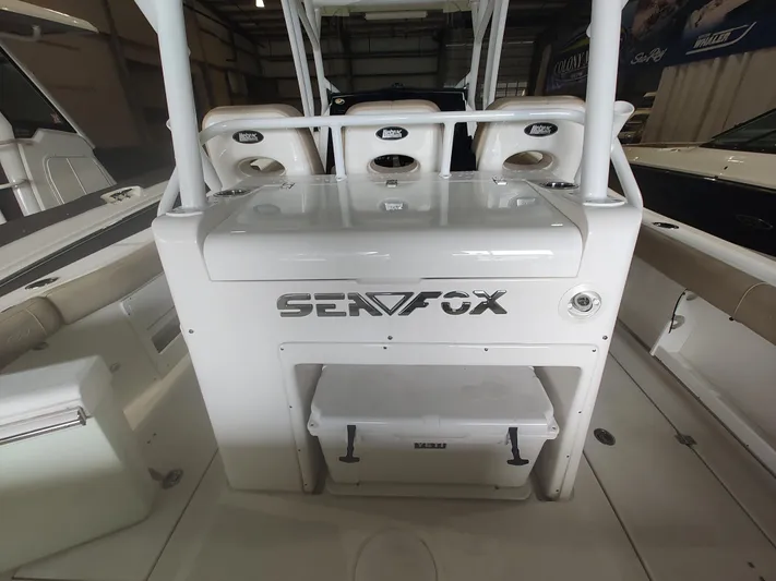  Yacht Photos Pics 2017 Sea Fox 328 Commander boat interior with seating and storage.