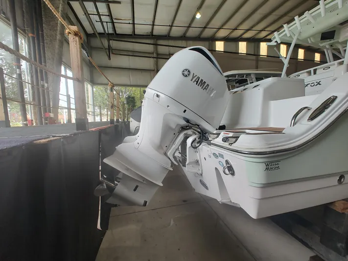  Yacht Photos Pics 2017 Sea Fox 328 Commander with Yamaha outboard engine in a storage facility.