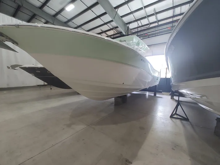  Yacht Photos Pics 2017 Sea Fox 328 Commander boat in indoor storage facility.