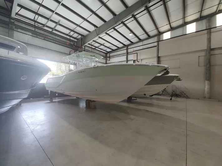  Yacht Photos Pics 2017 Sea Fox 328 Commander boat in a spacious indoor storage facility.