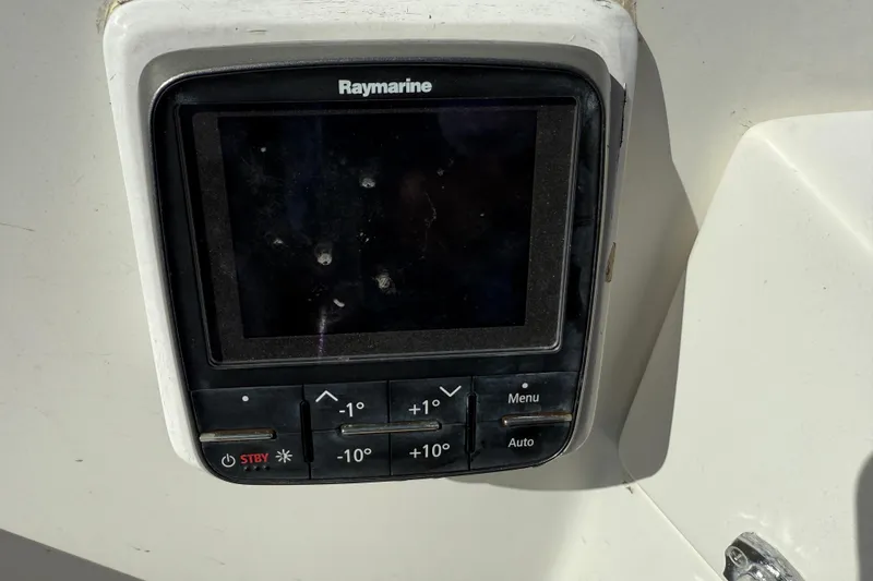 Acadia Yacht Photos Pics Raymarine navigation system on 1997 Tartan 3800 yacht, featuring control buttons and display.