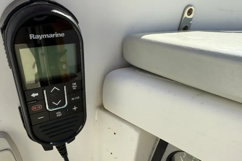 Acadia Yacht Photos Pics Raymarine marine radio on 1997 Tartan 3800 yacht, mounted on white panel.