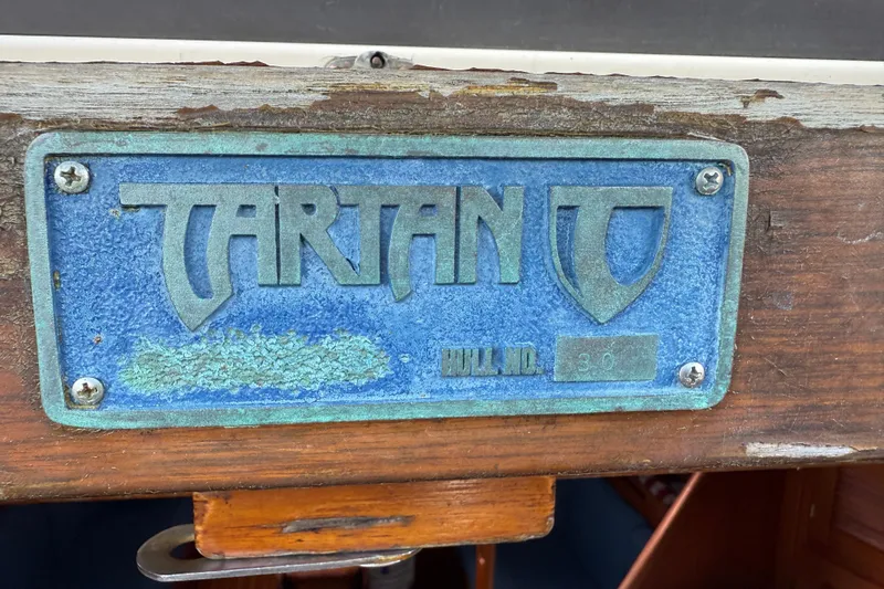 Acadia Yacht Photos Pics Plaque of 1997 Tartan 3800 sailboat, showing model and hull number.