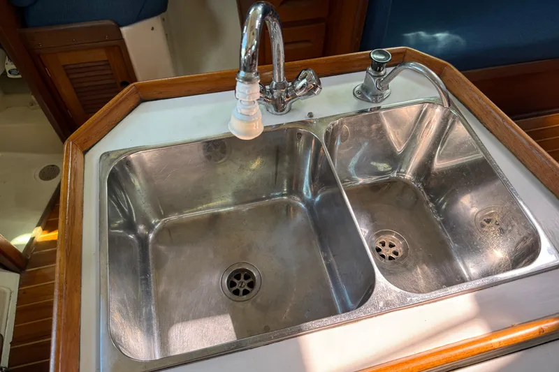 Acadia Yacht Photos Pics Stainless steel double sink in 1997 Tartan 3800 yacht galley.