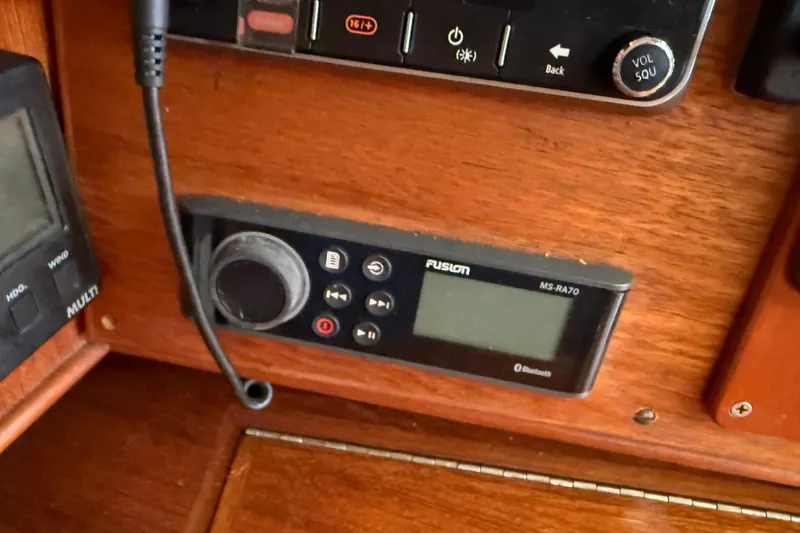 Acadia Yacht Photos Pics Fusion MS-RA70 marine stereo on Tartan 3800, 1997 model, with Bluetooth connectivity.