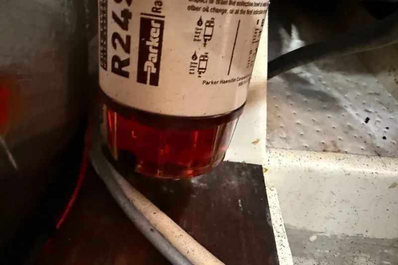 Acadia Yacht Photos Pics Fuel filter in a 1997 Tartan 3800 engine compartment, featuring Parker R24S model.