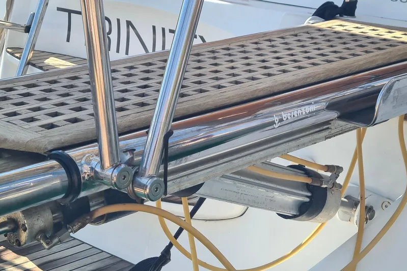  Yacht Photos Pics Close-up of Jeanneau Sun Odyssey 50 DS yacht's deck details, featuring stainless steel and wood elements.