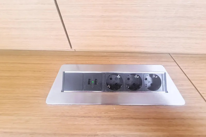  Yacht Photos Pics Electrical outlet panel with USB ports on Jeanneau Sun Odyssey 50 DS, 2009 model.