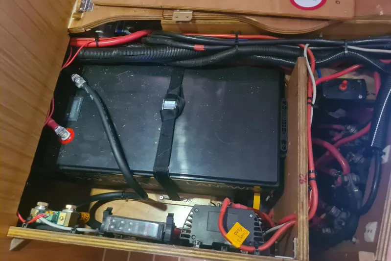  Yacht Photos Pics Battery compartment of 2009 Jeanneau Sun Odyssey 50 DS sailboat, showing wiring and connections.