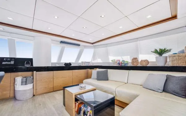 Euphoria Yacht Photos Pics Luxurious interior of 2016 Sunreef 60 LOFT yacht with modern furnishings and ample natural light.