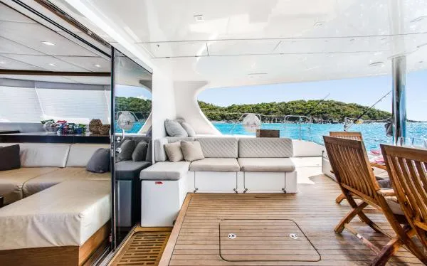 Euphoria Yacht Photos Pics Luxurious Sunreef 60 LOFT yacht interior with elegant seating and ocean view, 2016 model.