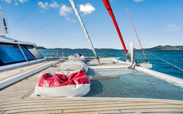 Euphoria Yacht Photos Pics Sunreef 60 LOFT 2016 yacht deck with bean bags and ocean view.