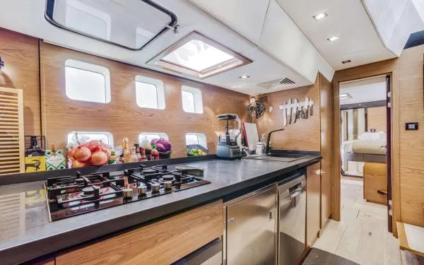 Euphoria Yacht Photos Pics Luxurious kitchen interior of 2016 Sunreef 60 LOFT yacht with modern appliances.