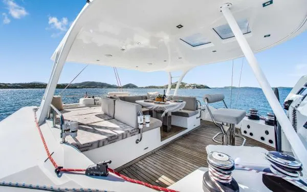 Euphoria Yacht Photos Pics Luxurious 2016 Sunreef 60 LOFT yacht deck with seating, ocean view, and modern amenities.