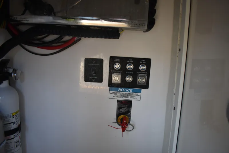  Yacht Photos Pics Control panel of 2024 Regal 36 XO boat with fire extinguisher and wiring.