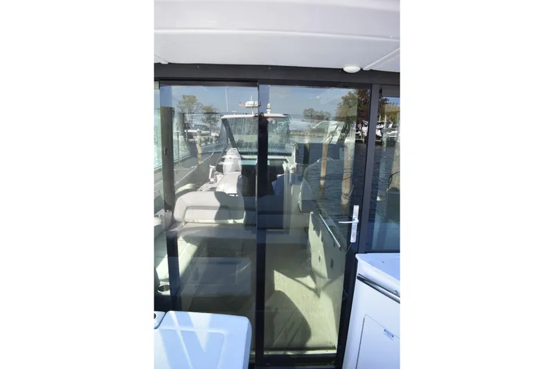  Yacht Photos Pics 2024 Regal 36 XO yacht with glass sliding door and interior view.