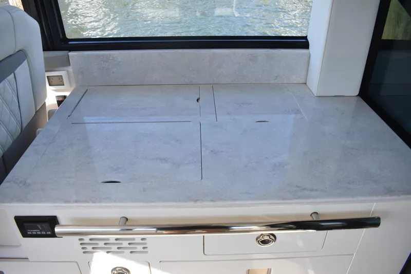  Yacht Photos Pics 2024 Regal 36 XO yacht interior with sleek countertop and modern design.