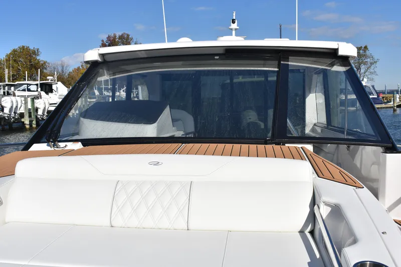  Yacht Photos Pics 2024 Regal 36 XO yacht with sleek design and luxurious seating.