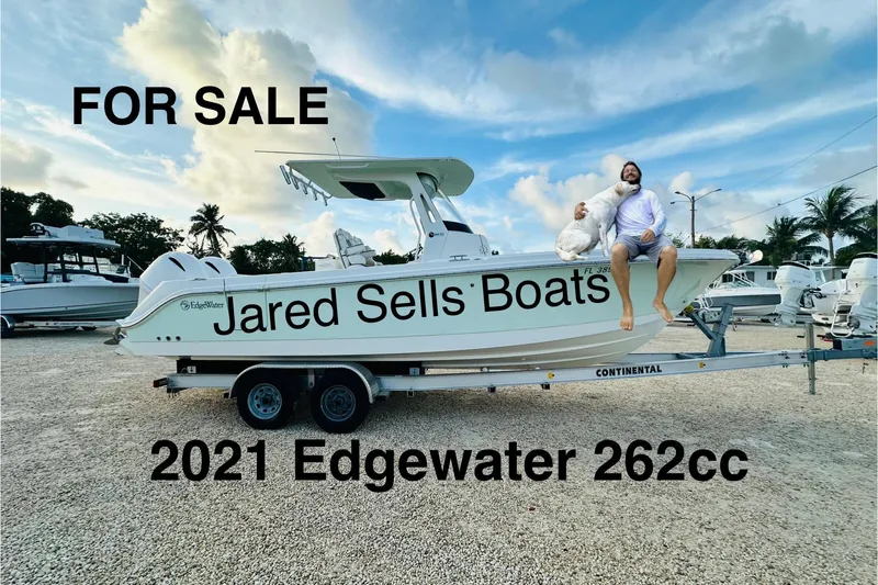 Yacht Photos Pics 2021 Edgewater 262CC boat for sale on trailer, featuring "Jared Sells Boats" text.