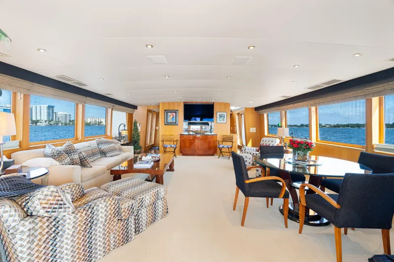 Crown Jewel Yacht Photos Pics Luxurious interior of 1996 Broward 96 Raised Pilothouse MY yacht with elegant furnishings.