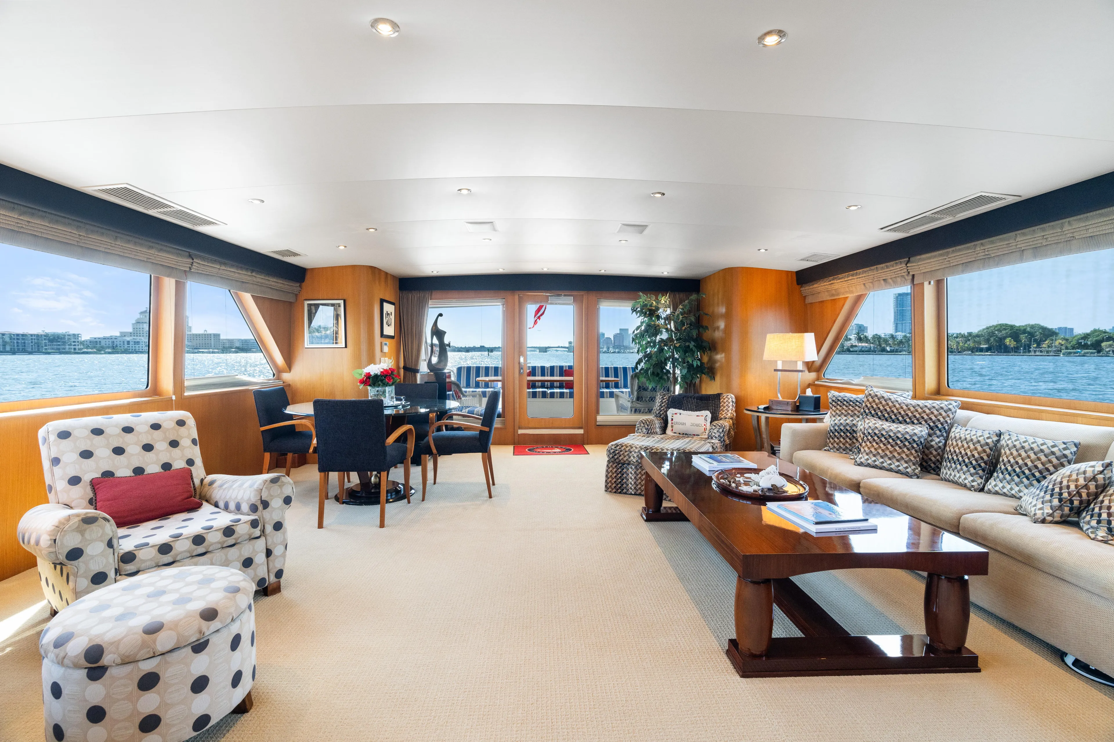 Crown Jewel Yacht Photos Pics Luxurious interior of 1996 Broward 96 Raised Pilothouse MY yacht with elegant furnishings.