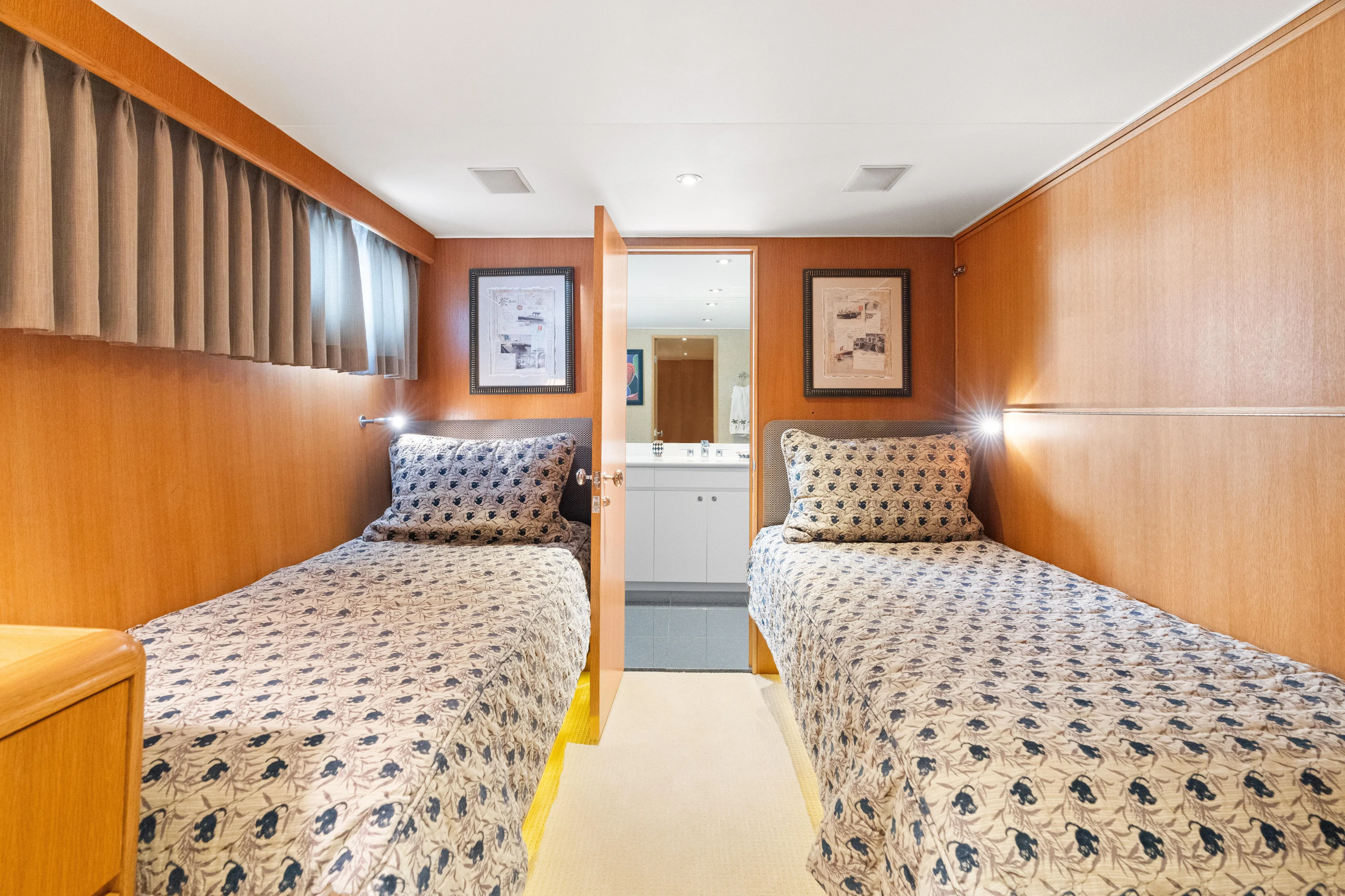 Crown Jewel Yacht Photos Pics Twin cabin interior of 1996 Broward 96 Raised Pilothouse MY yacht.