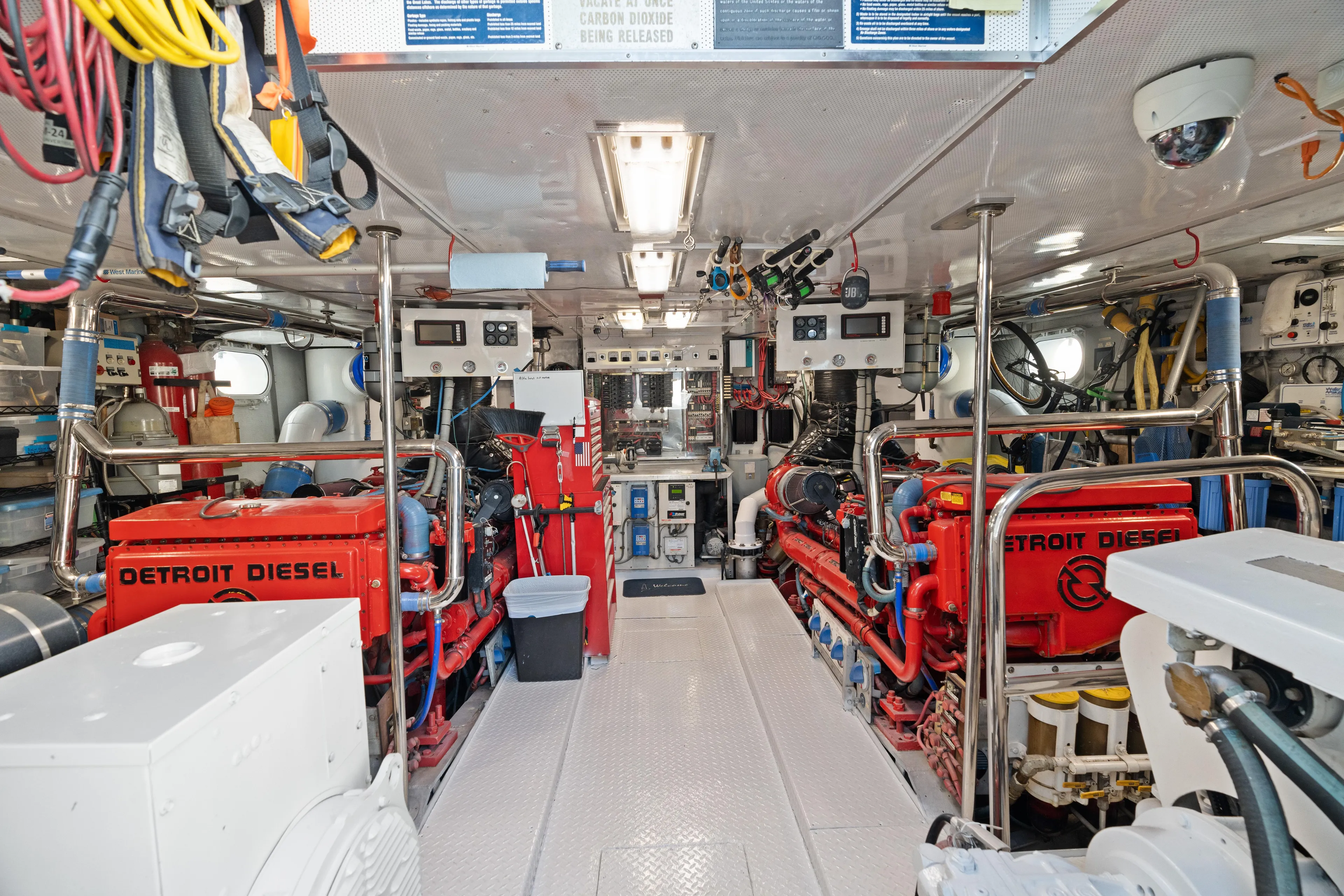 Crown Jewel Yacht Photos Pics Engine room of 1996 Broward 96 Raised Pilothouse MY with Detroit Diesel engines.