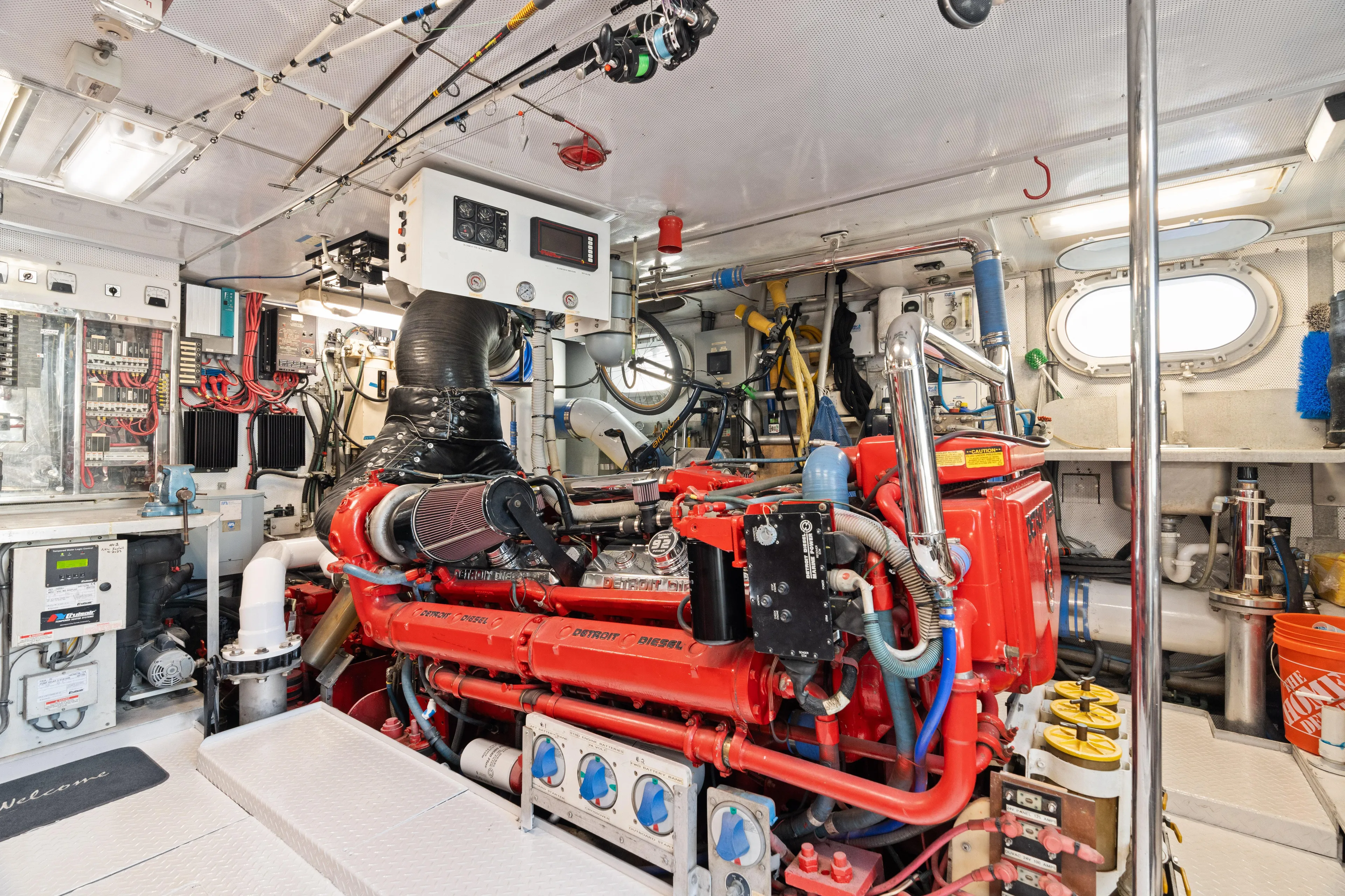 Crown Jewel Yacht Photos Pics Engine room of 1996 Broward 96 Raised Pilothouse MY, featuring complex machinery and equipment.