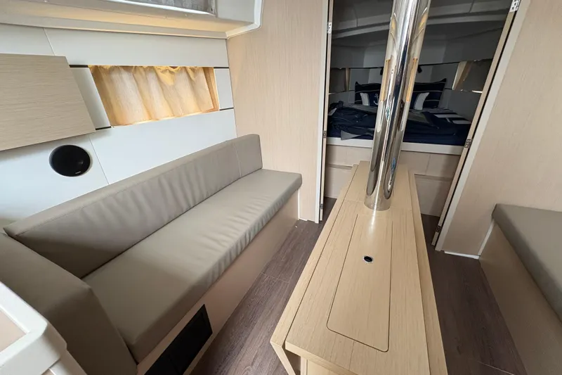  Yacht Photos Pics Interior of 2021 Beneteau Oceanis 38.1 yacht, featuring modern seating and sleek design.