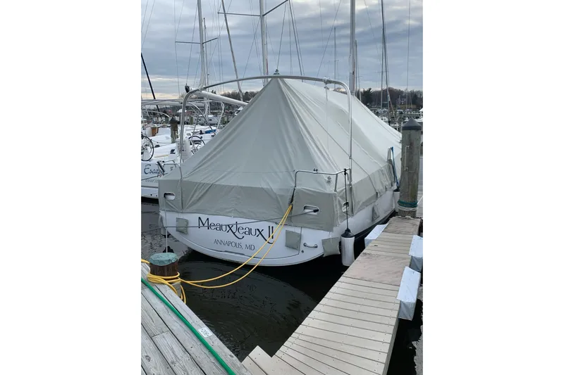  Yacht Photos Pics 2021 Beneteau Oceanis 38.1 sailboat docked, covered, in Annapolis marina.