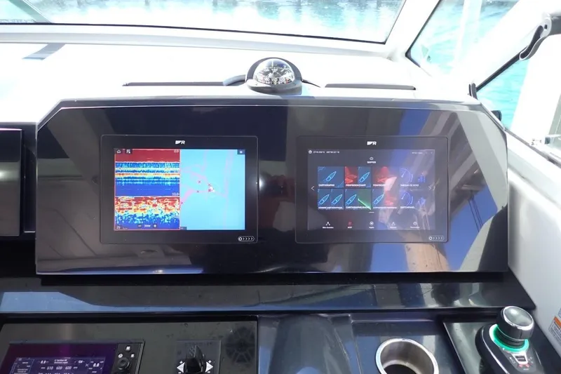  Yacht Photos Pics Dashboard of 2023 Formula 380 Super Sport Crossover OB with navigation screens.