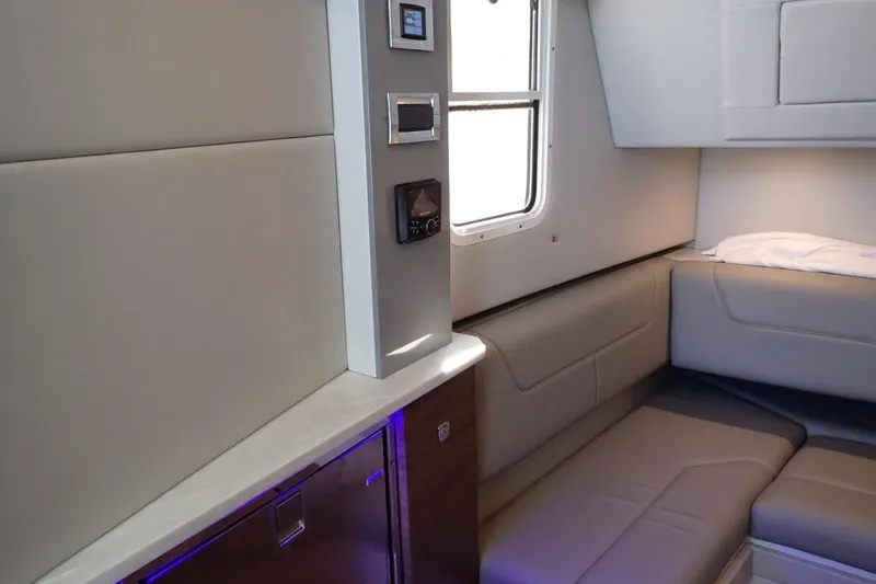 Yacht Photos Pics 2023 Formula 380 Super Sport Crossover OB interior with modern seating and control panel.