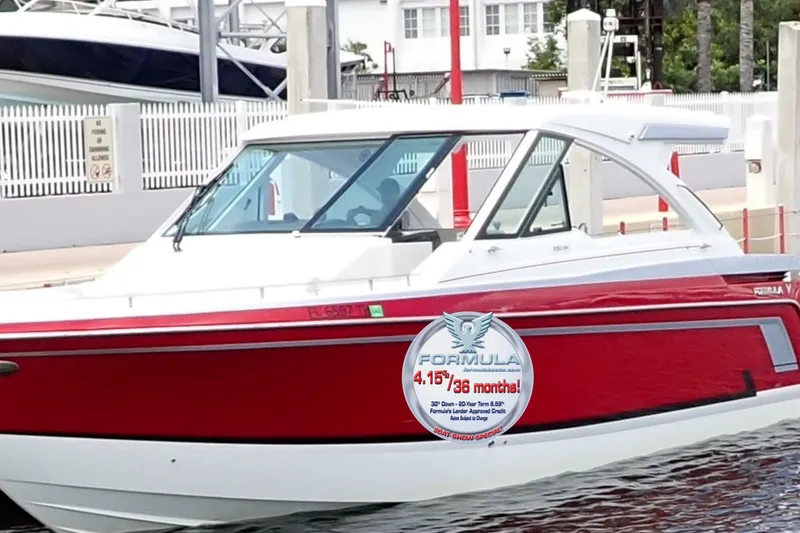  Yacht Photos Pics 2023 Formula 380 Super Sport Crossover OB boat in vibrant red at a marina.