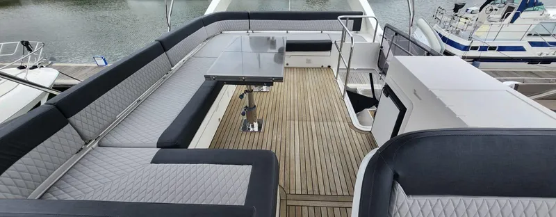  Yacht Photos Pics Luxurious 2017 Galeon 550 Fly yacht with spacious deck and elegant seating.