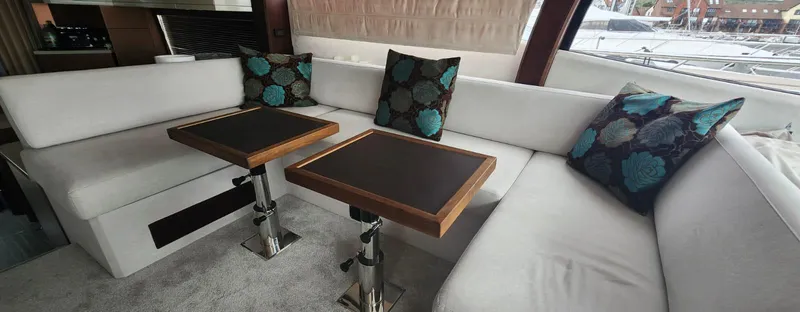  Yacht Photos Pics Luxurious interior of 2017 Galeon 550 Fly yacht with elegant seating and tables.