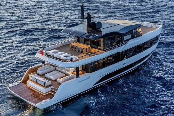  Yacht Photos Pics Luxurious 2024 Arcadia Yachts A96 cruising on open sea, showcasing elegant design and spacious decks.