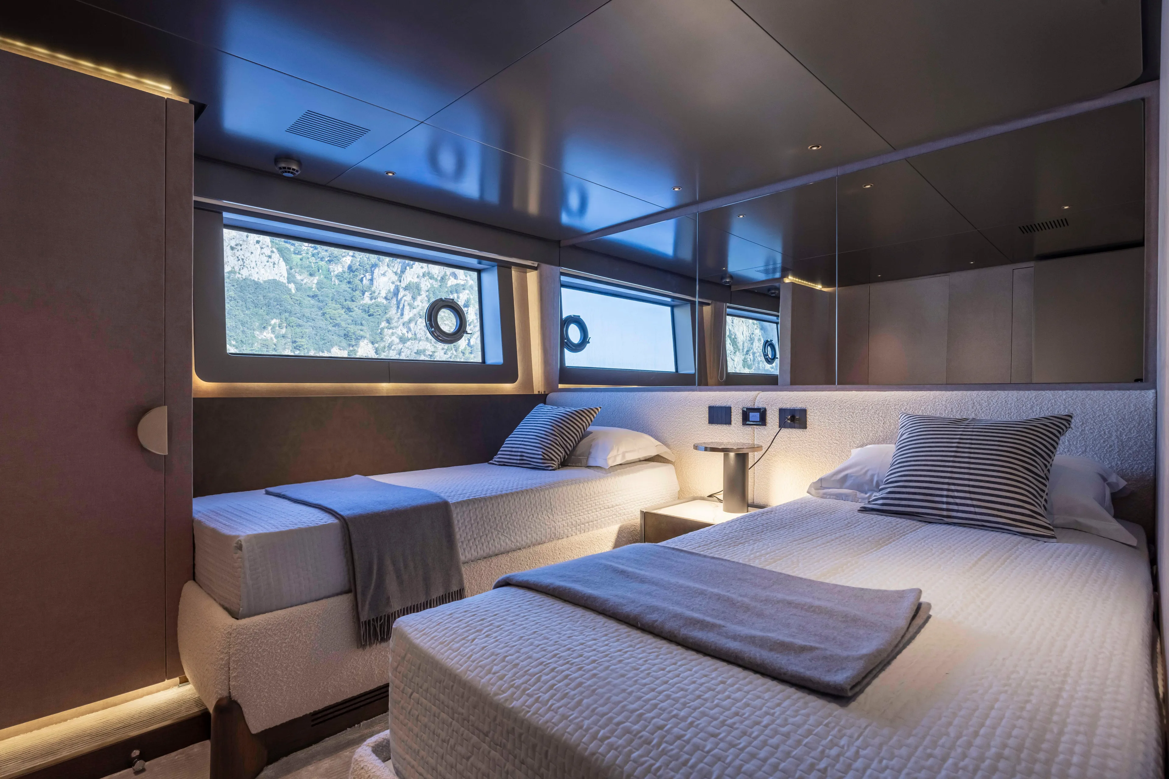  Yacht Photos Pics Luxurious twin cabin interior of 2024 Arcadia Yachts A96 with scenic window views.