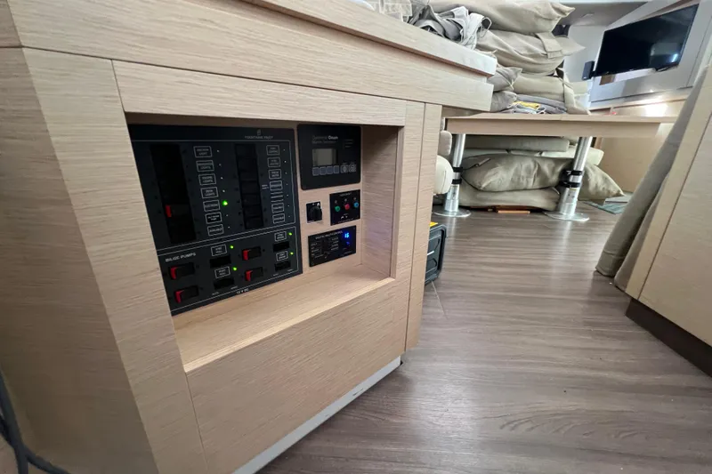 B&b Yachts Yacht Photos Pics Control panel inside 2019 Fountaine Pajot SABA 50 yacht, featuring modern interior design.