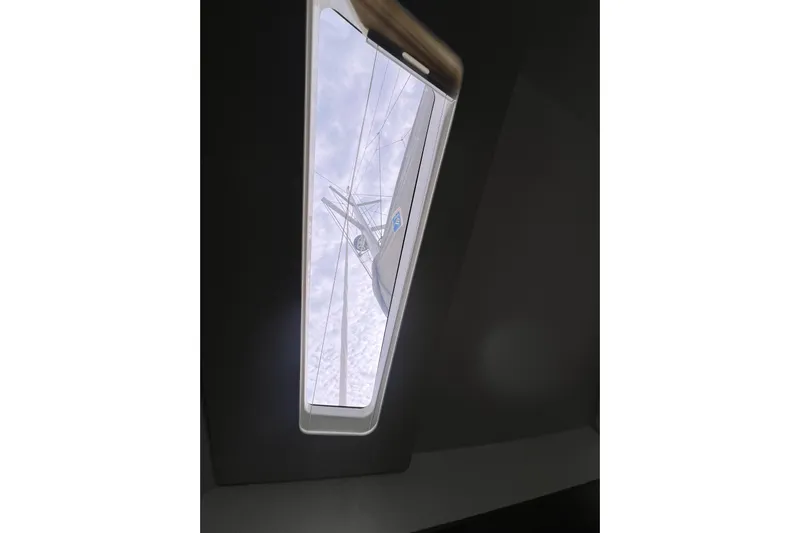 B&b Yachts Yacht Photos Pics Skylight view from 2019 Fountaine Pajot SABA 50 catamaran, showcasing mast and rigging.