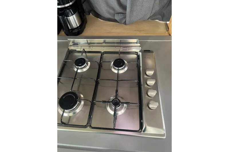 B&b Yachts Yacht Photos Pics Stainless steel stovetop with four burners on a 2019 Fountaine Pajot SABA 50 yacht.