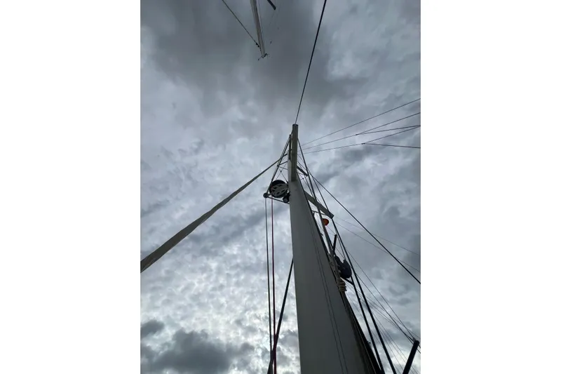 B&b Yachts Yacht Photos Pics Mast of 2019 Fountaine Pajot SABA 50 catamaran against cloudy sky.