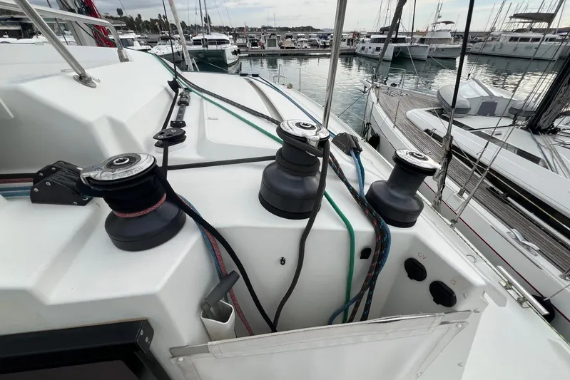 B&b Yachts Yacht Photos Pics 2019 Fountaine Pajot SABA 50 yacht deck with winches and ropes at marina.
