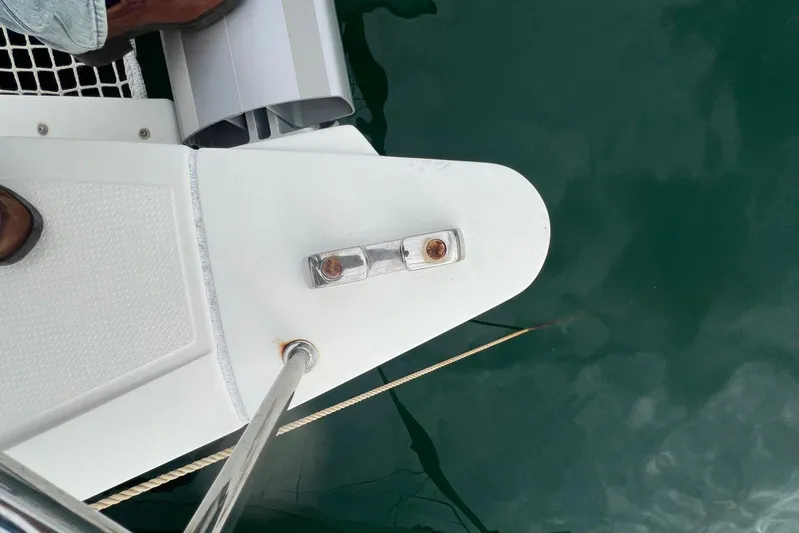 B&b Yachts Yacht Photos Pics 2019 Fountaine Pajot SABA 50 catamaran deck with cleat and railing over water.