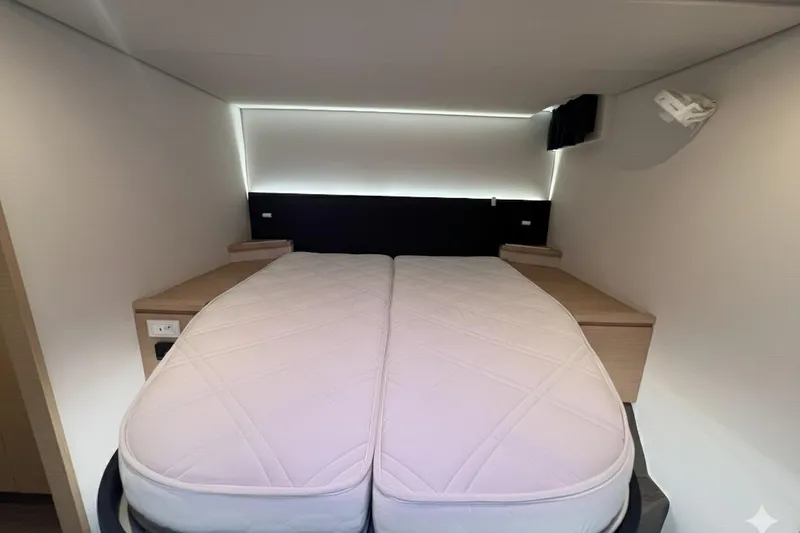 B&b Yachts Yacht Photos Pics 2019 Fountaine Pajot SABA 50 cabin with a neatly made bed and modern design.